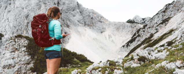 Girl looks at a Mountain