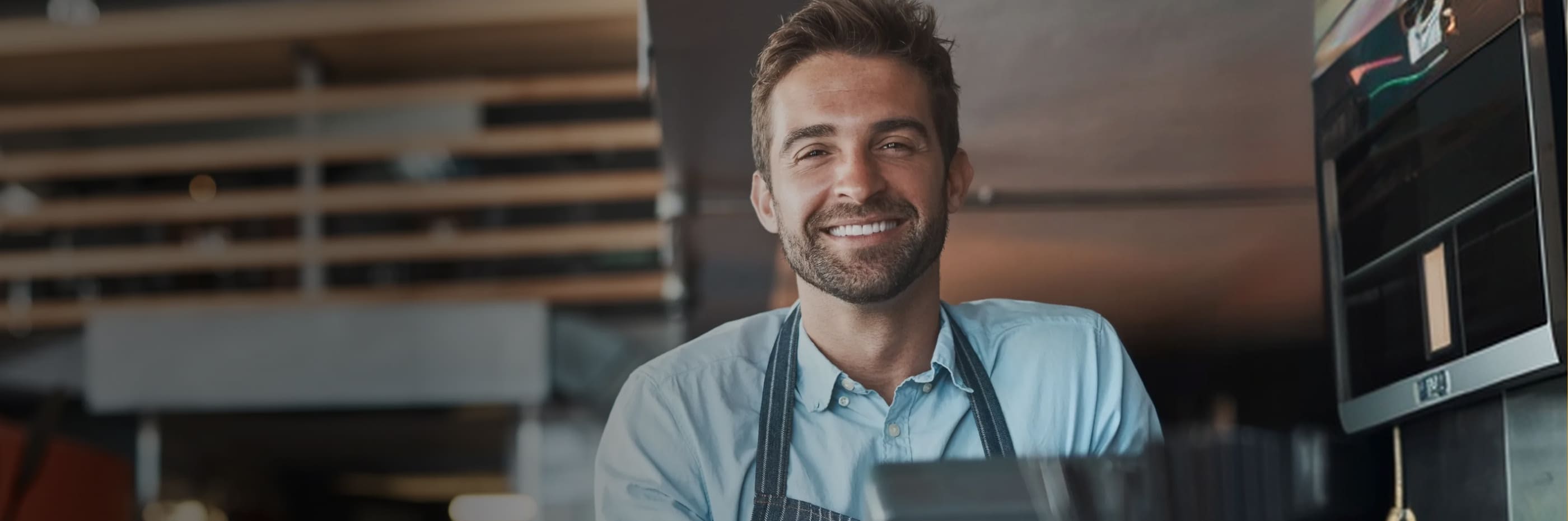 barista empreendedor sorri